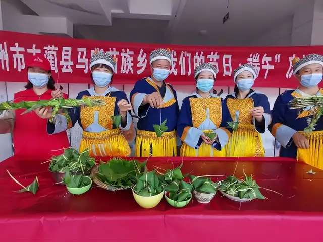 「泸州」马嘶苗族乡：民族团结一家亲“粽情粽义”跟党走-1.jpg